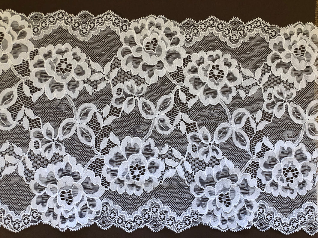 White scalloped lace shop fabric